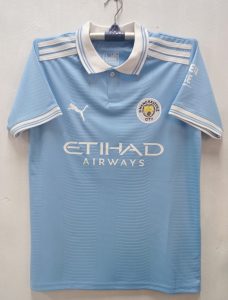 Manchester City Home Jersey Half Sleeve 24/25 Manchester City Home Jersey Half Sleeve 24/25 Product details of Manchester City Home Jersey Half Sleeve 24/25: Semi Thai Fabric Gender: Men/Women Color: Blue Sky Suitable for: Everyday / Sports Practice Sleeve: Sort Sleeve Logo: Embroidery Size: M,L,XL,XXL